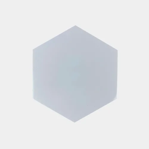 Harteflooring haxagonal grande autoadhesivo blanco frentee gris.webp